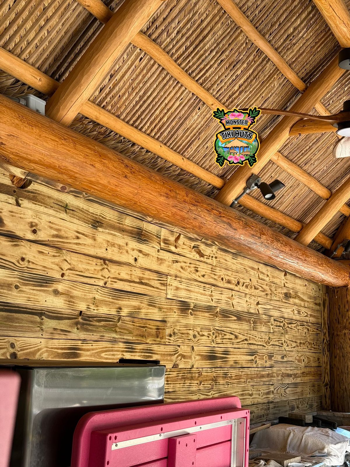 Privacy wall with tiki hut — outdoor screening