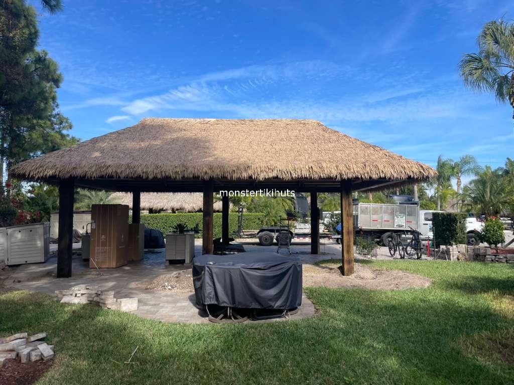 Large rectangular tiki hut with synthetic thatch hip roof