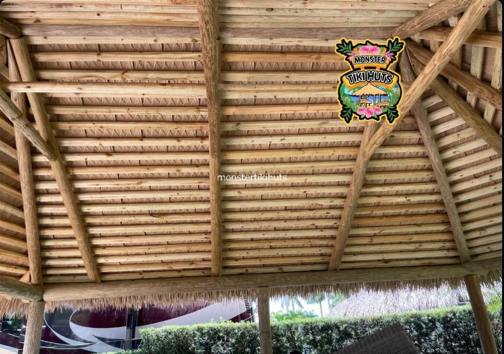 Fanned synthetic thatch interior at a resort structure