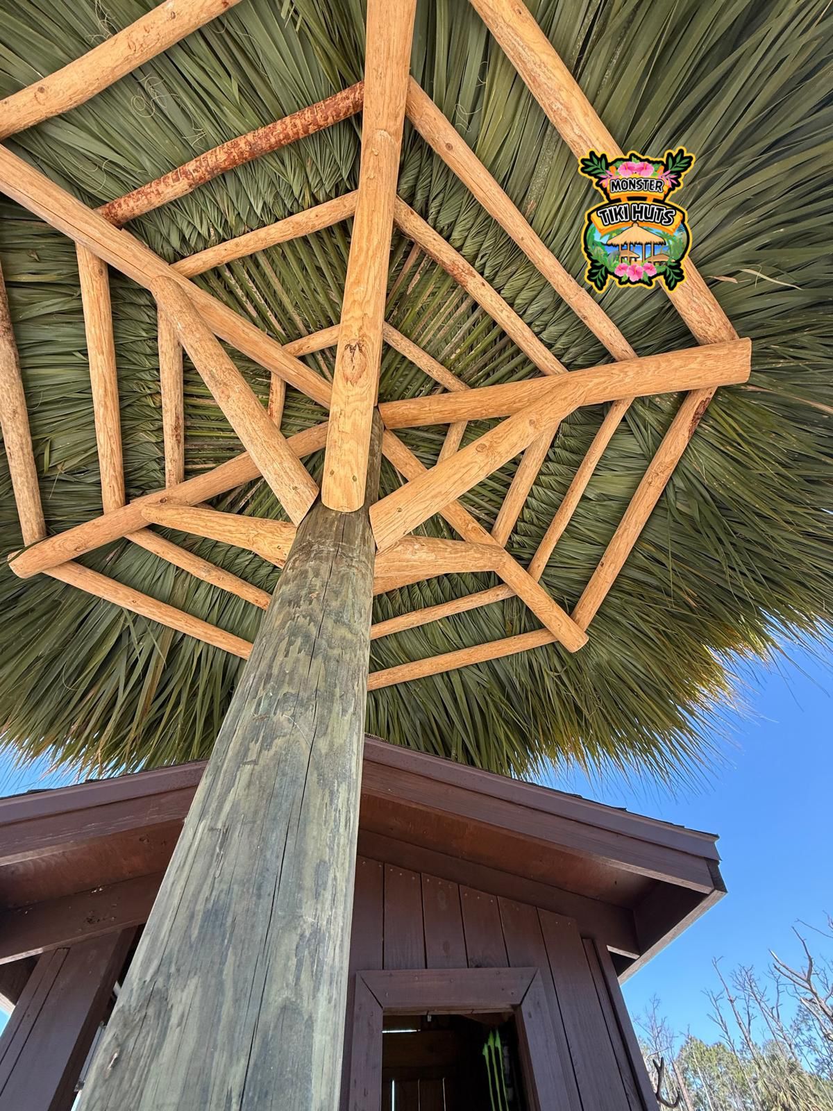 Single post tiki hut umbrella — poolside 3